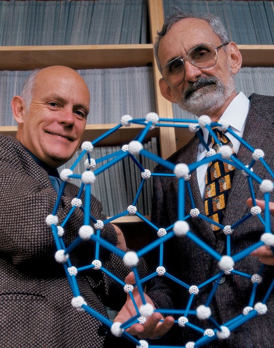 Richard Smalley and Robert Curl with models of buckyballs