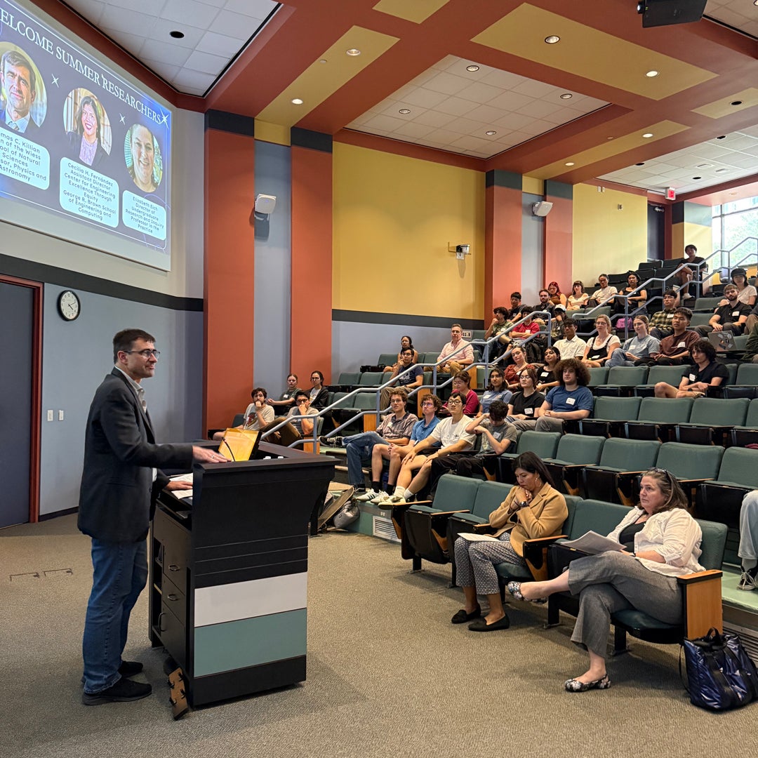 Dean of Natural Sciences Tom Killian welcoming undergraduate summer researchers to Rice at a May 29 reception