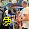 Students speak with a professor at a May 31 welcome reception for 180 undergraduates who are working this summer in research programs in Rice laboratories